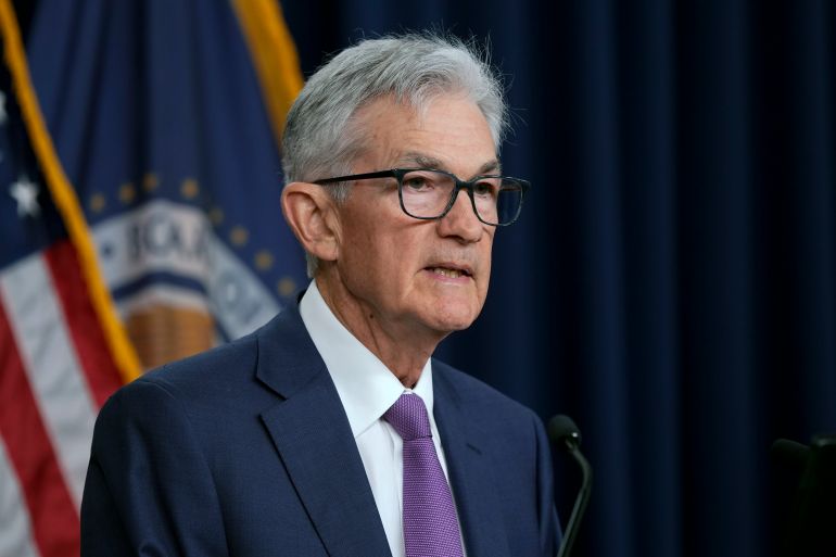 US Federal Reserve Holds Rates Steady, Signals Careful Approach on Future Cuts